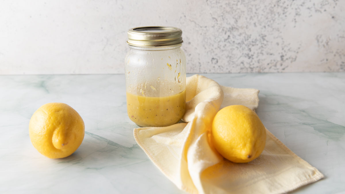 Honey lemon salad dressing in a canning jar.