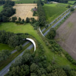 Aerial photo of a wildlife crossing over a highway.